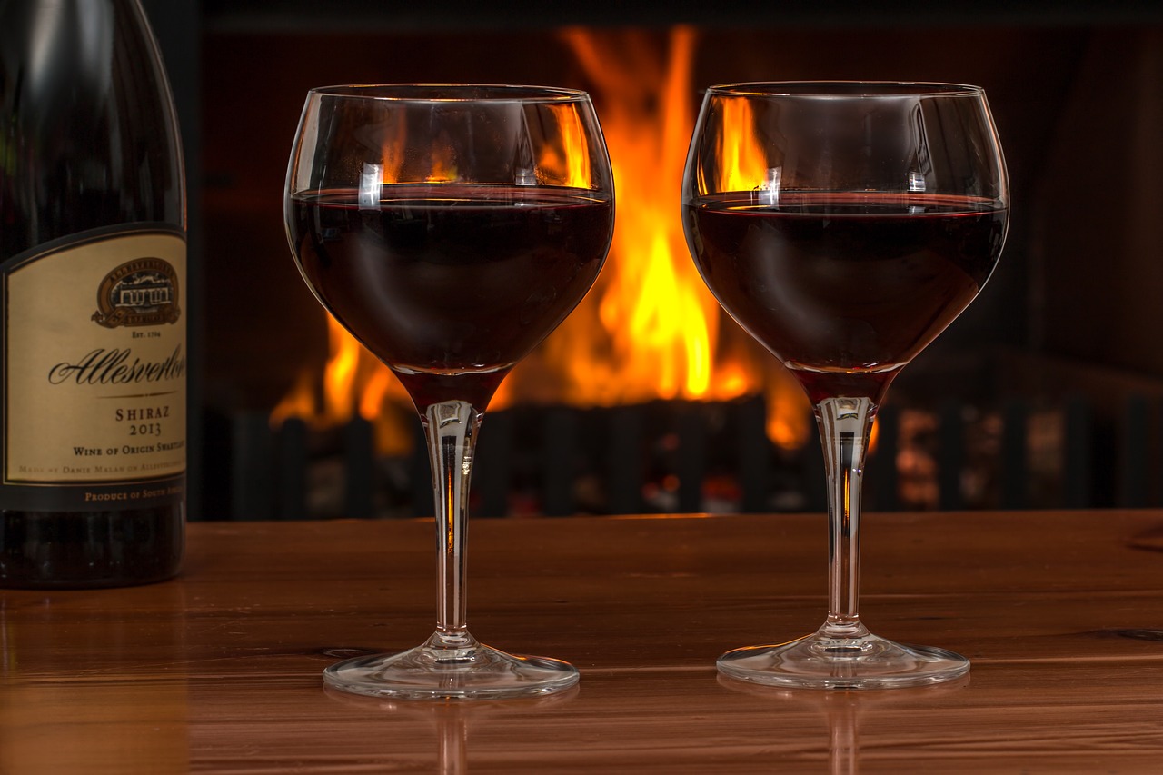 wine glasses by the fireplace